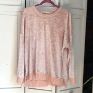 Pink velour set sweatshirt and pants.